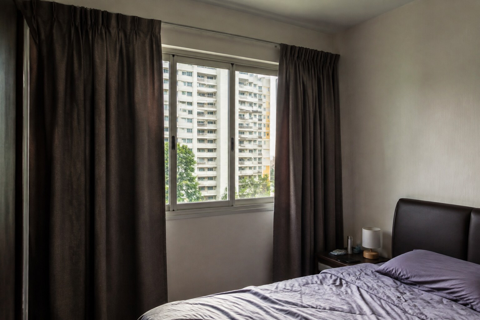 Close view of textured curtain fabric in natural window light