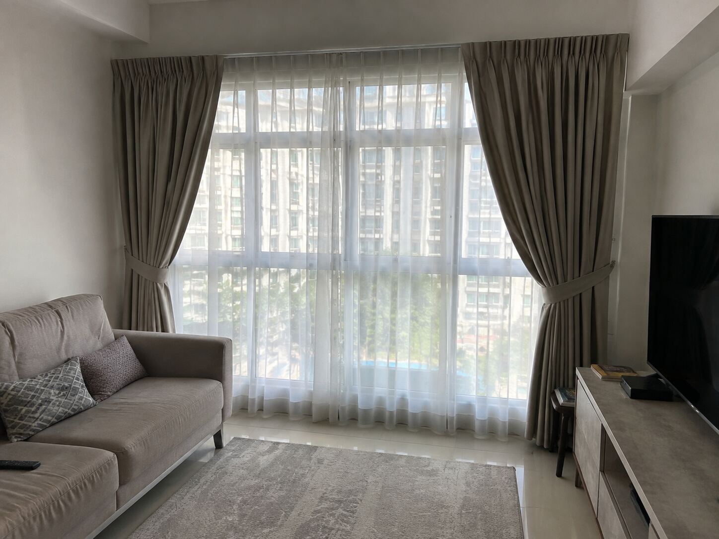 BTO or HDB living room with layered curtains