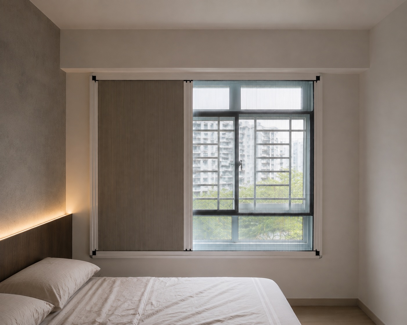 2-in-1 Mesh & Blind installed across a Singapore HDB bedroom window, with the pleated blackout panel drawn on the left and the insect mesh revealing the view on the right