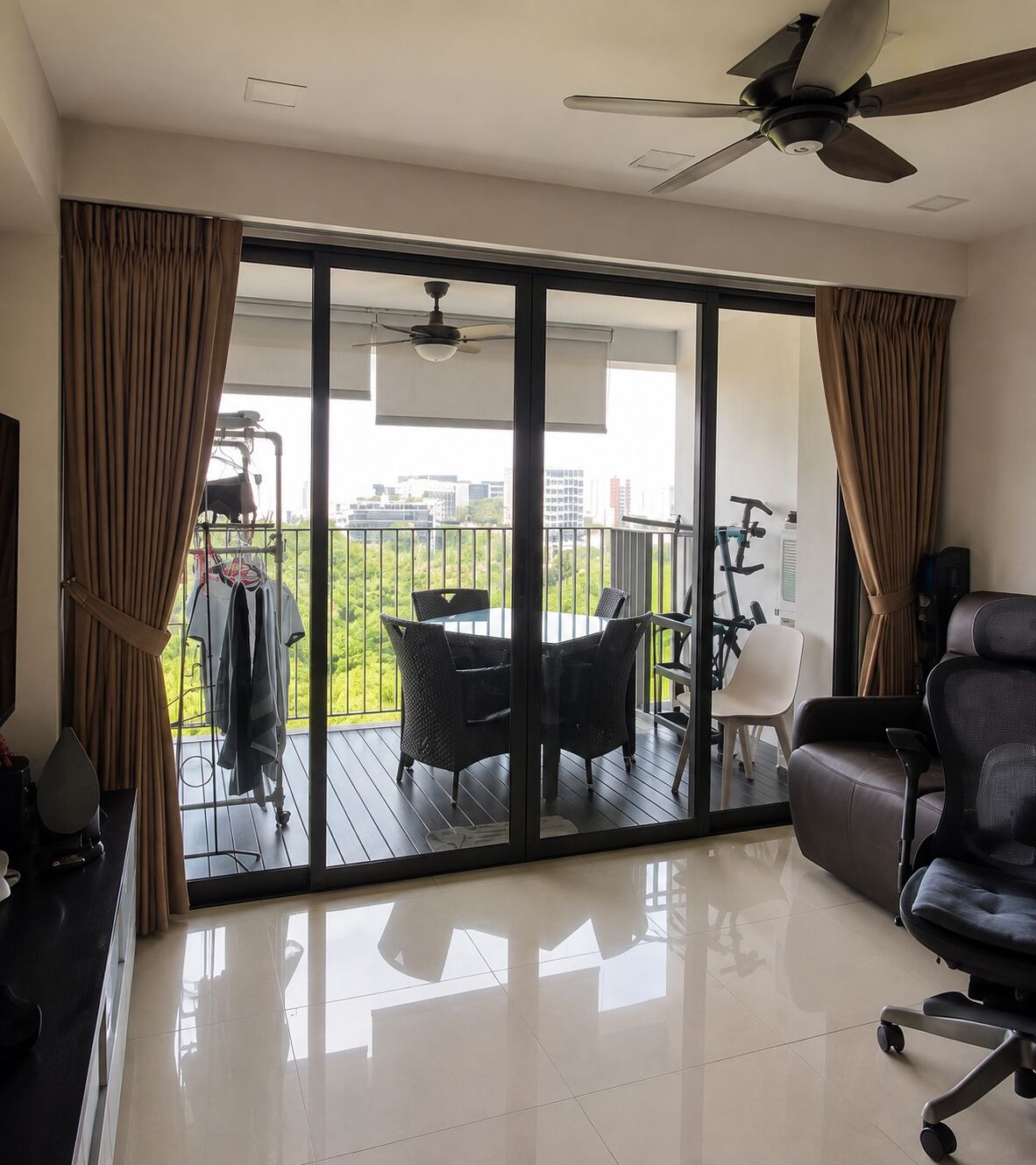 Condominium living room opening to a balcony