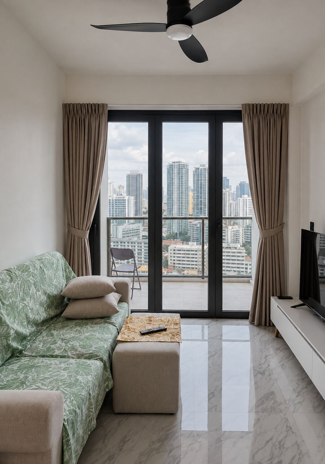 Condominium living room with curtains and city view
