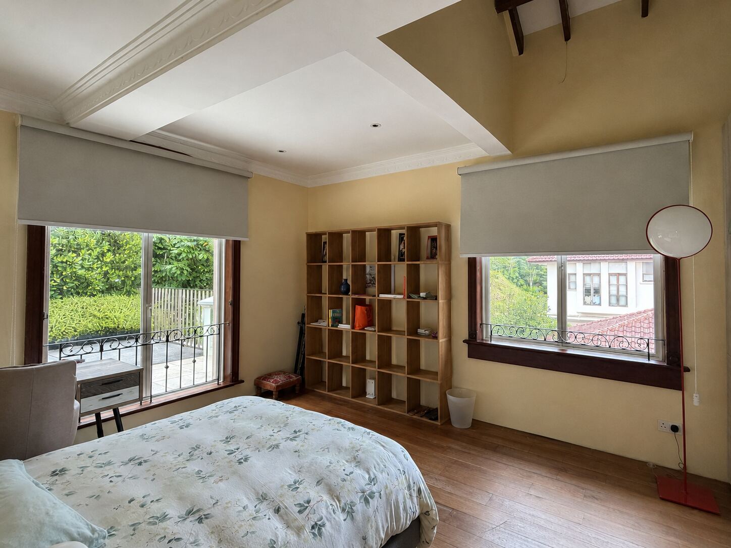 Landed home bedroom with roller blinds