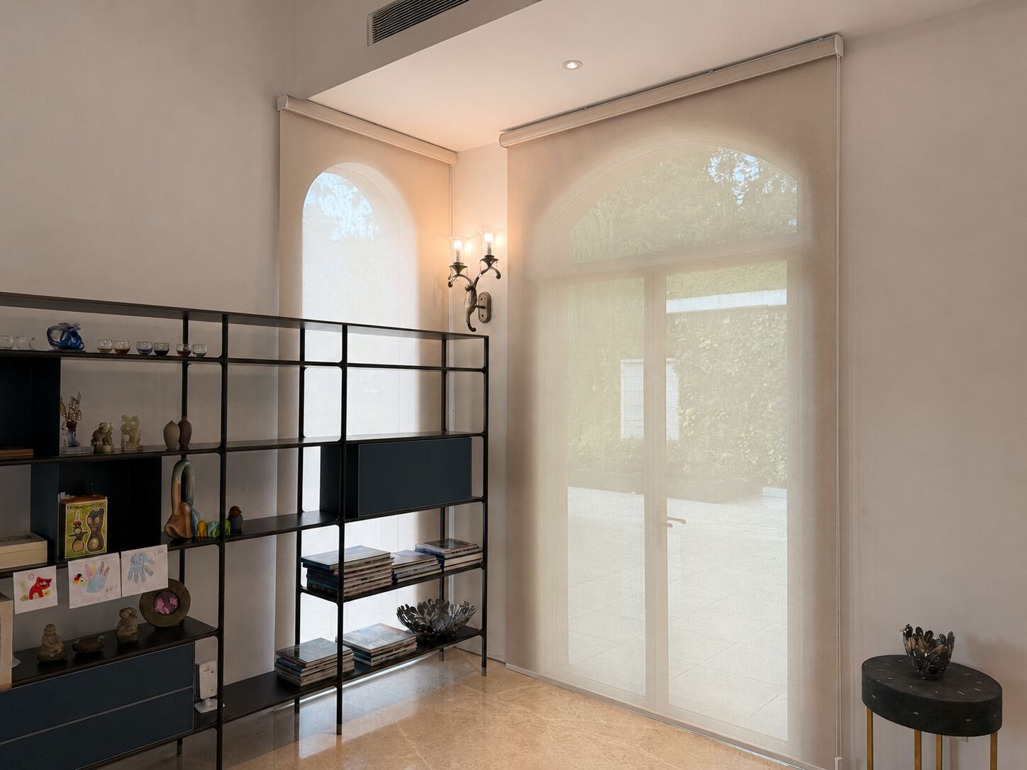 Landed home family room with roller blinds
