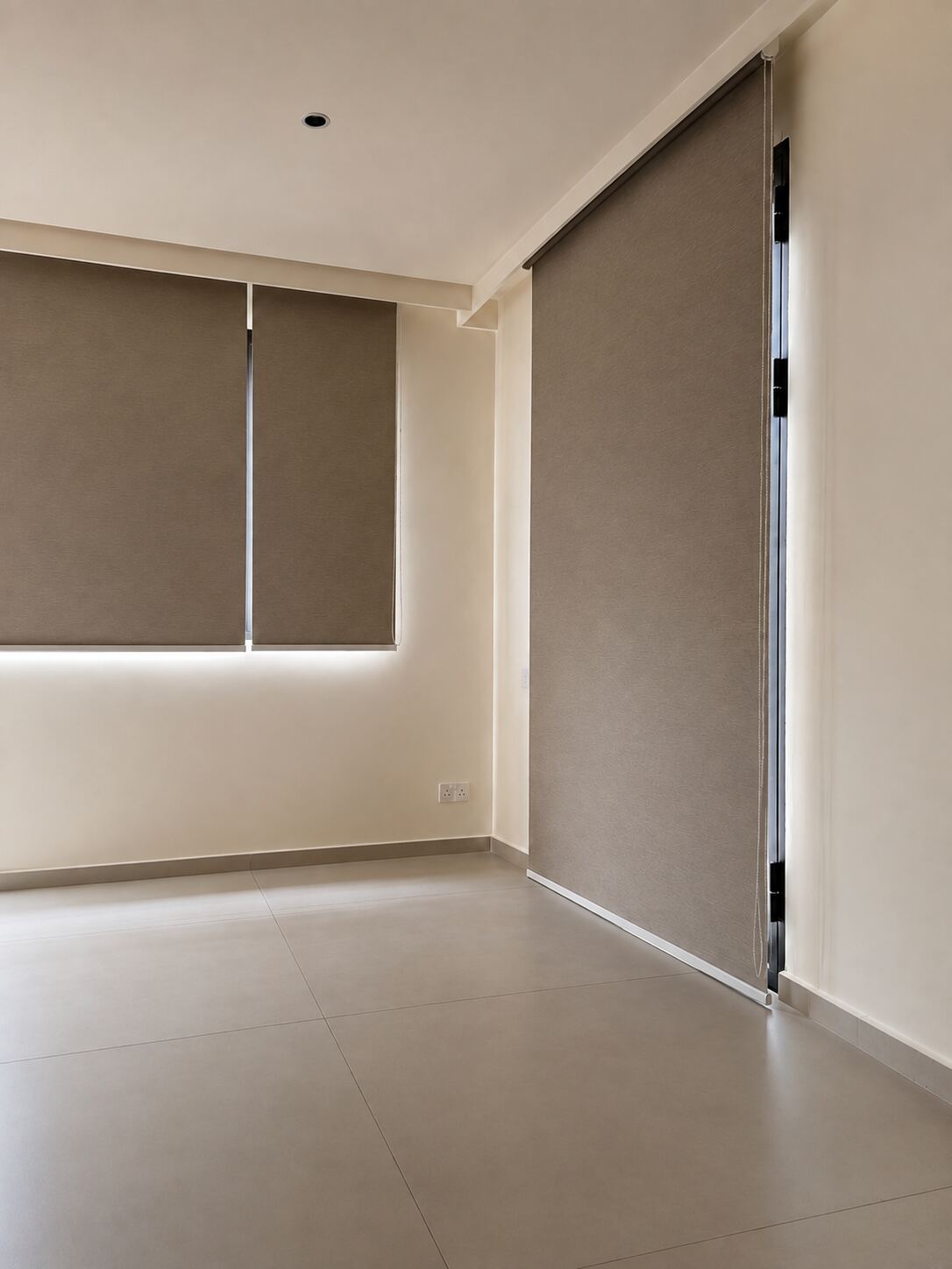 Landed home room fitted with roller blinds