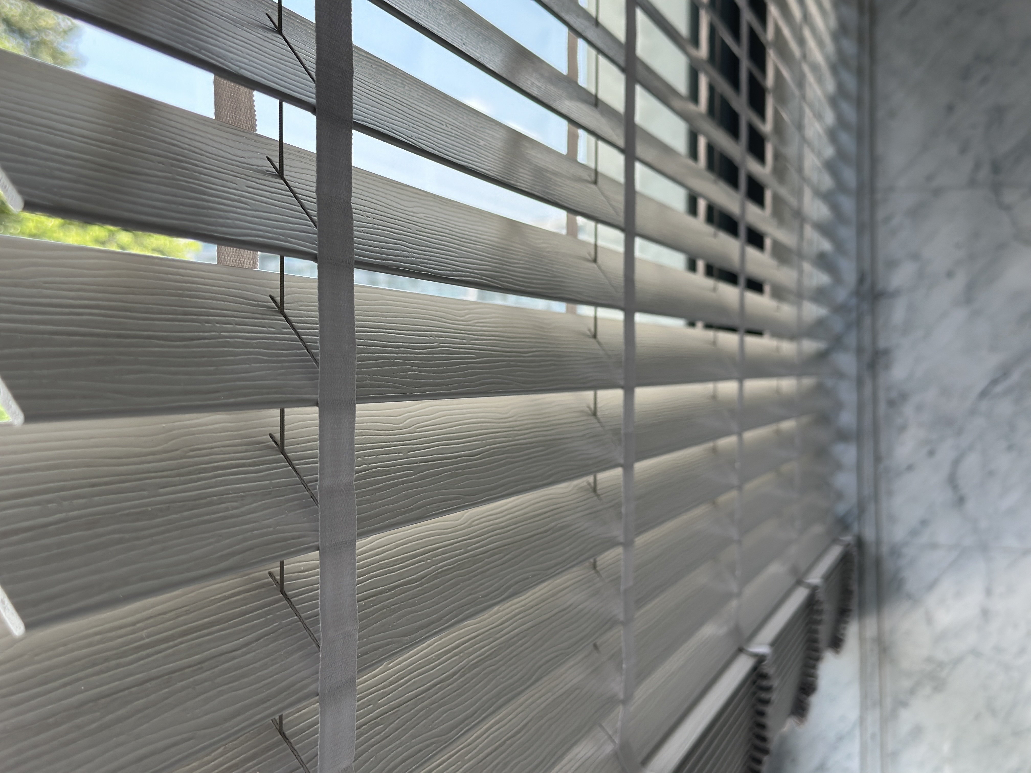 Venetian blind slats creating soft light patterns
